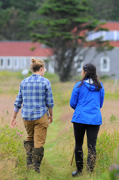 Patricia Jones walking with student